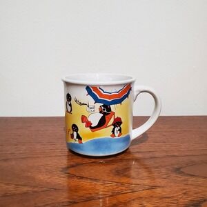 penguin mug - penguins‎ at the beach sunbathing, building sandcastles & swimming